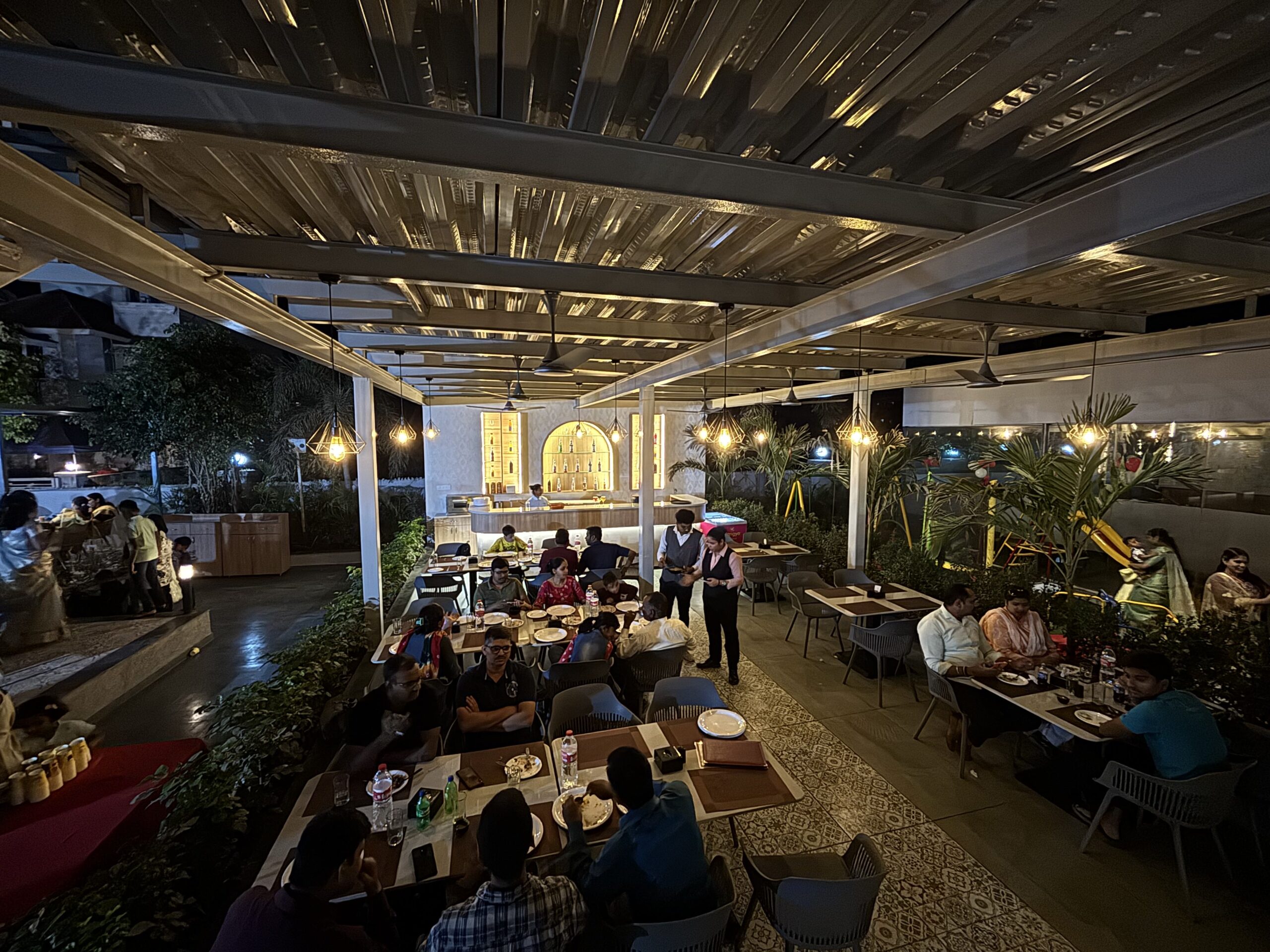 Family restaurant seating with mocktail and juice counter at Shivrudra Hotel Lohegaon Pune
